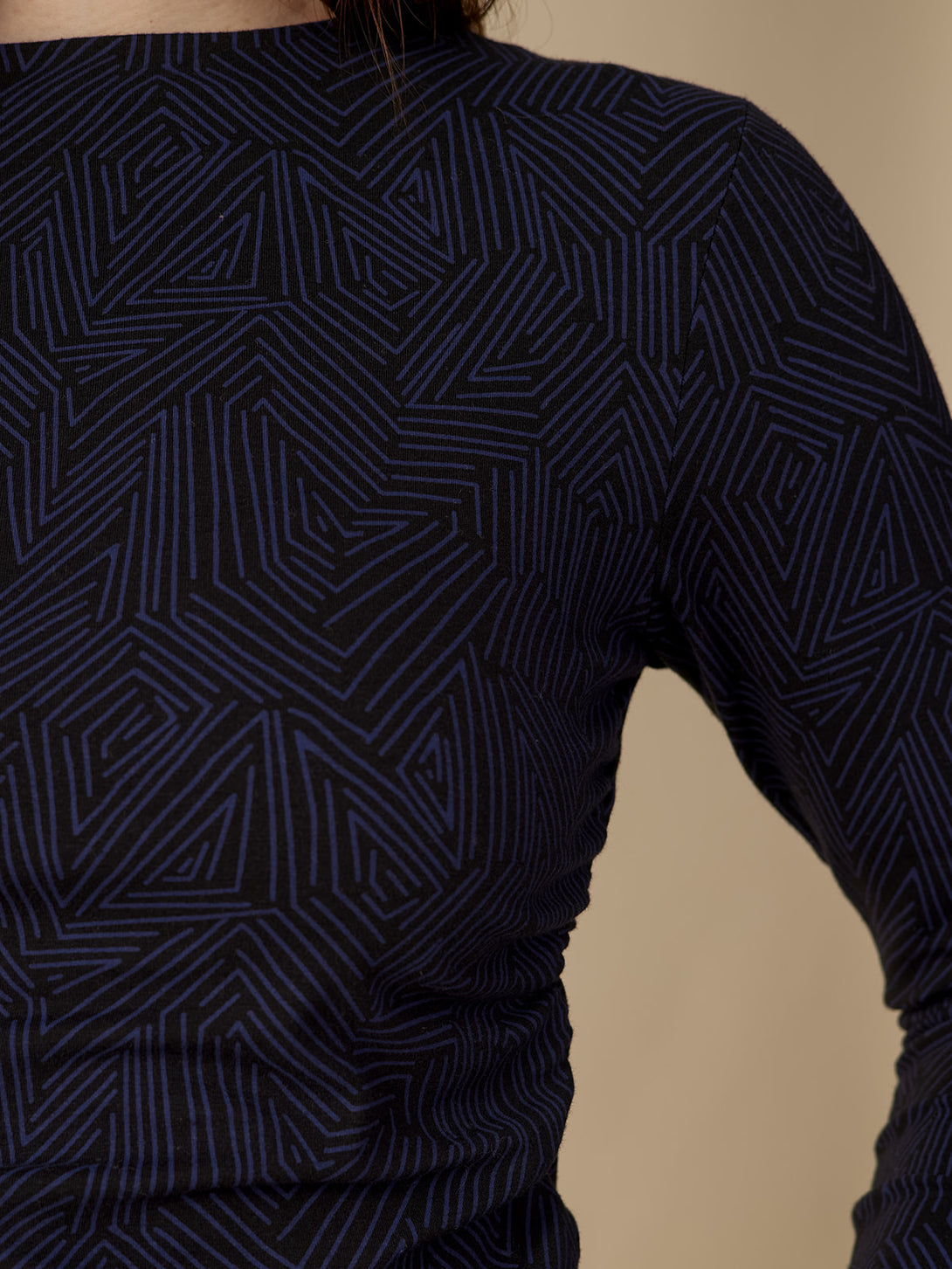 Close-up detail view of Tree Rings Navy and Black print, Women's Jersey Cotton Long Sleeve Top - Mata Traders Fair Trade