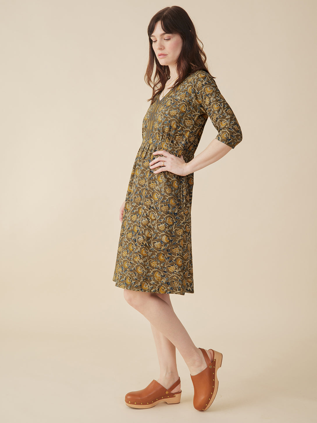 Jaya Half Sleeve Dress  Side view on model  Olive Kalamkari Print - Mata Traders