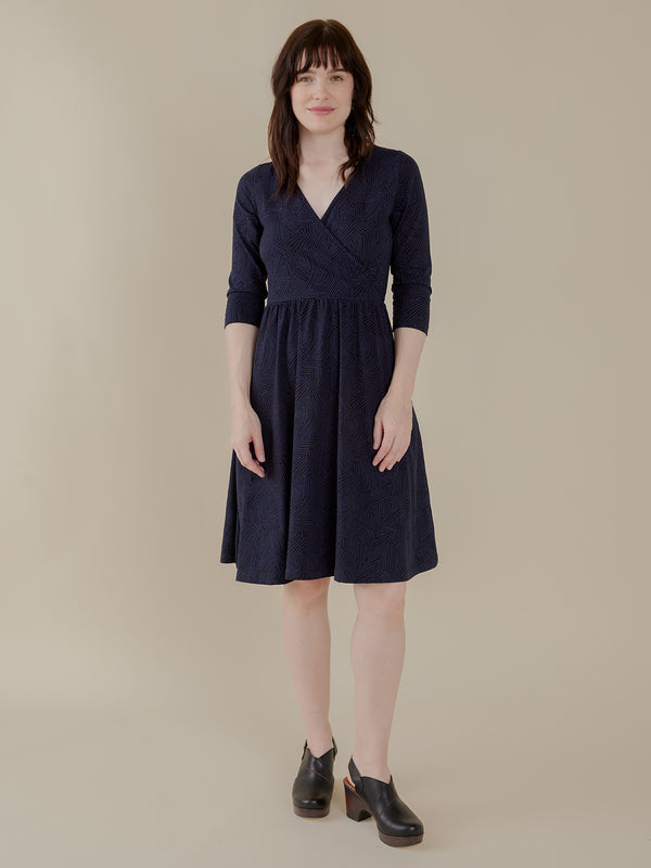 organic cotton navy blue wrap dress on model - Mata Traders Fair Trade Fashion Brand 