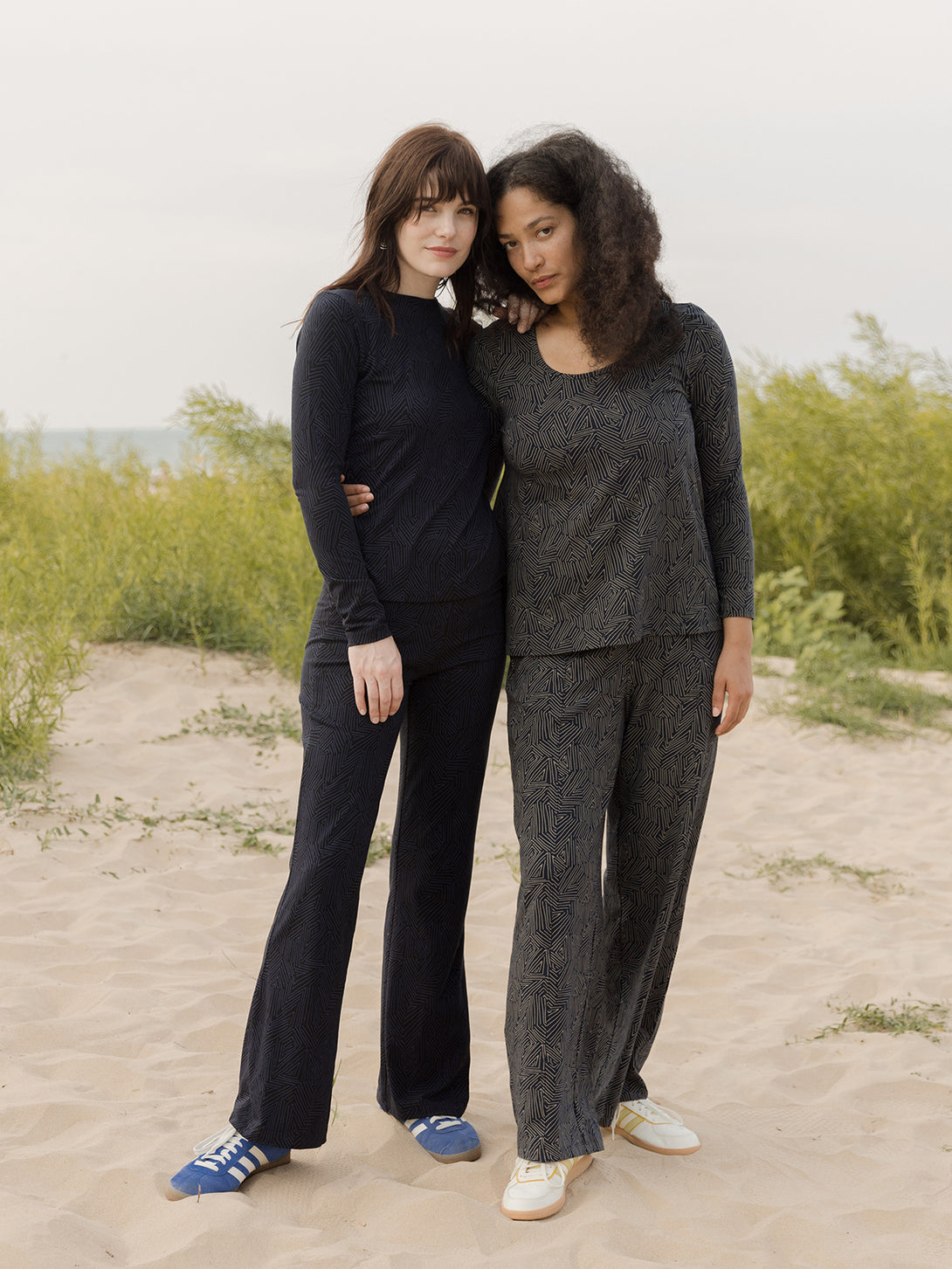 Navy fold over organic cotton women's casual pants on models at the beach- Mata Traders