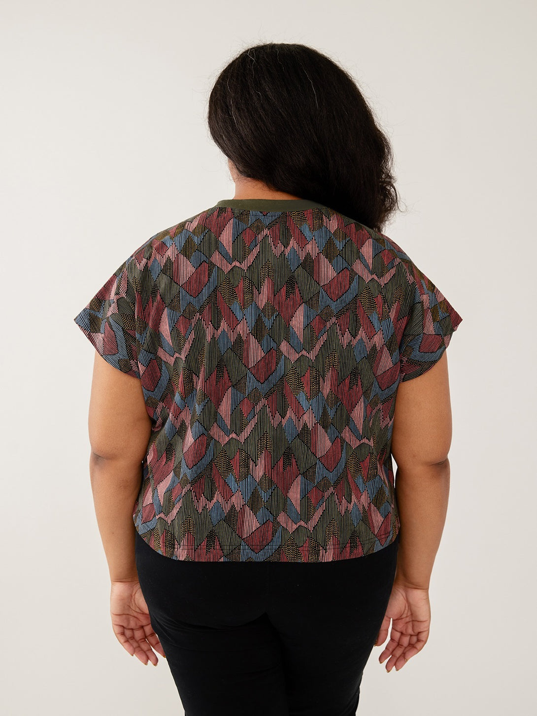 Organic cotton plus size back view of top in muted colors abstract jewel print - Mata Traders 
